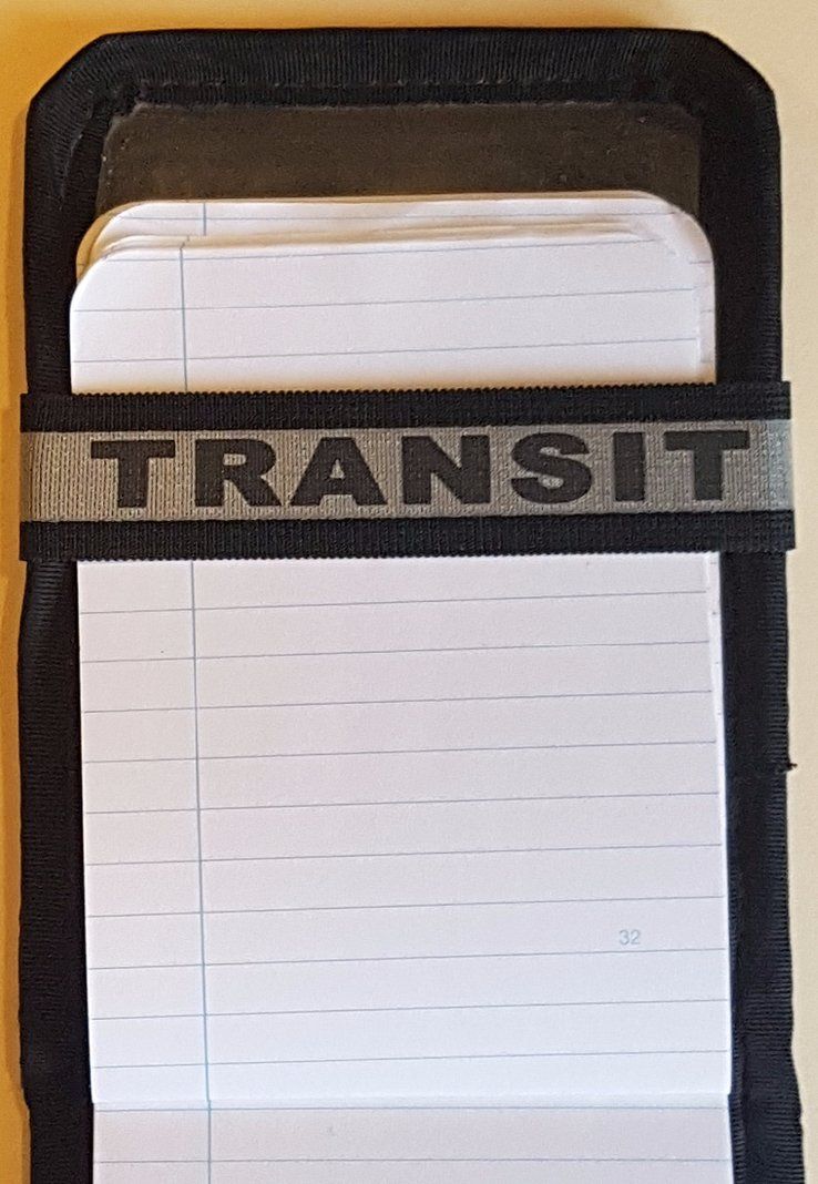 A Notebands™ for your Duty Notebook with the word transit on it