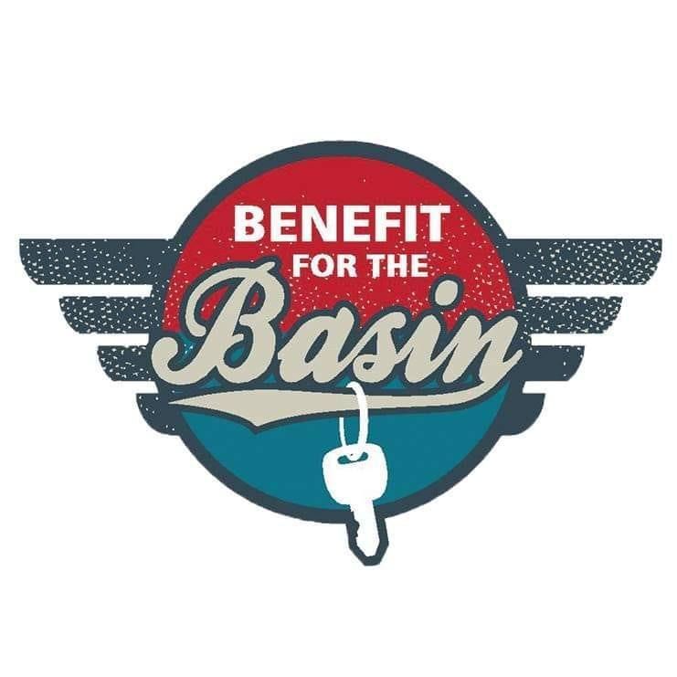 A logo with wings and a key, reading 