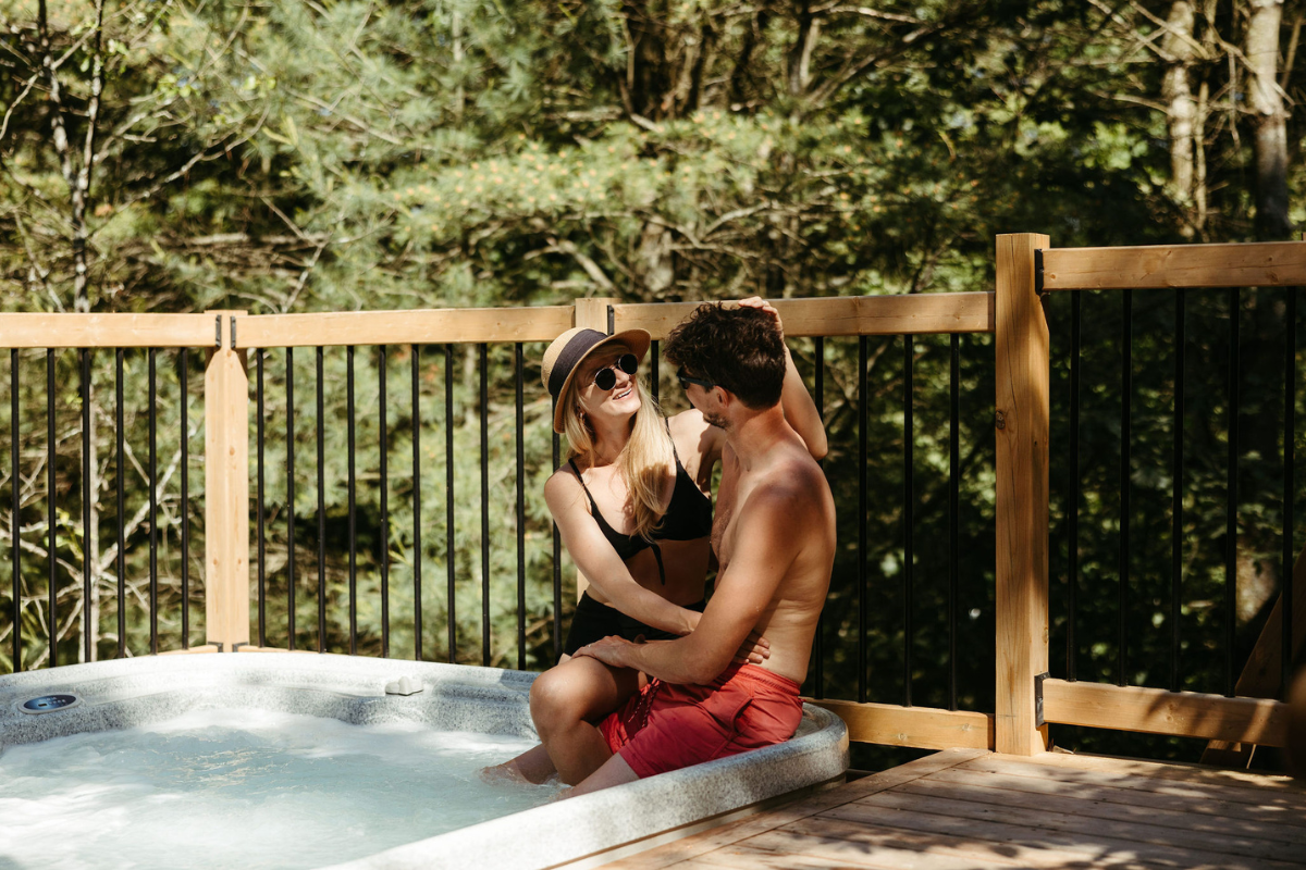 Couple glamping at Whispering Springs