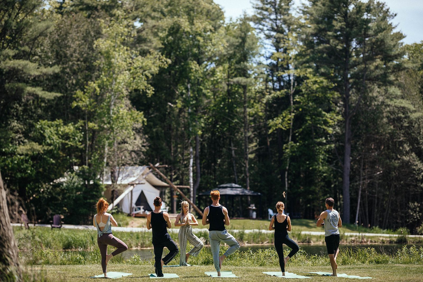 Outdoor yoga wellness experience at Whispering Springs Wildernes Retreat