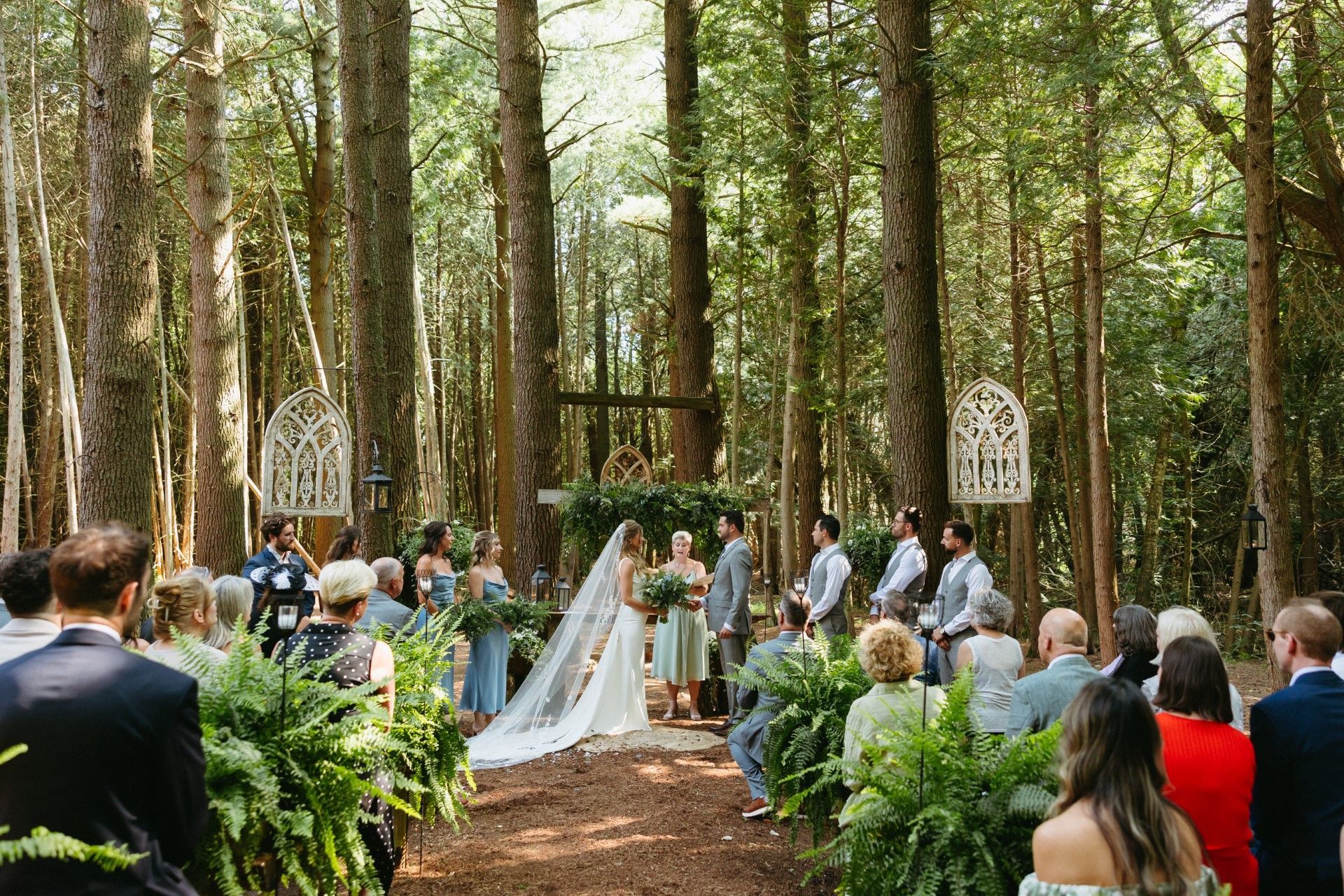 Wedding ceremony at Whispering Springs forest wedding venue near Toronto