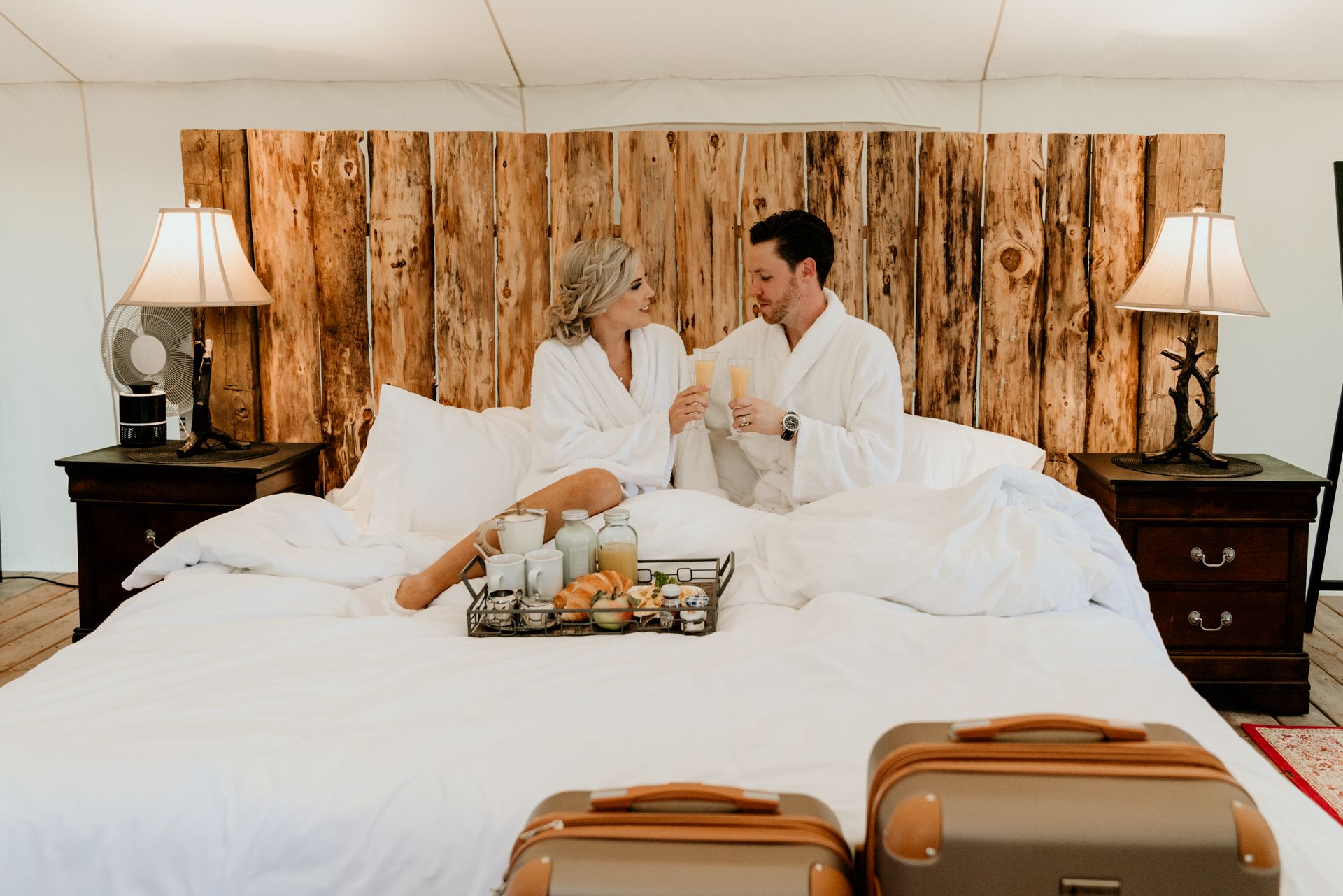 Couple enjoying luxury glamping tent at Whispering Springs