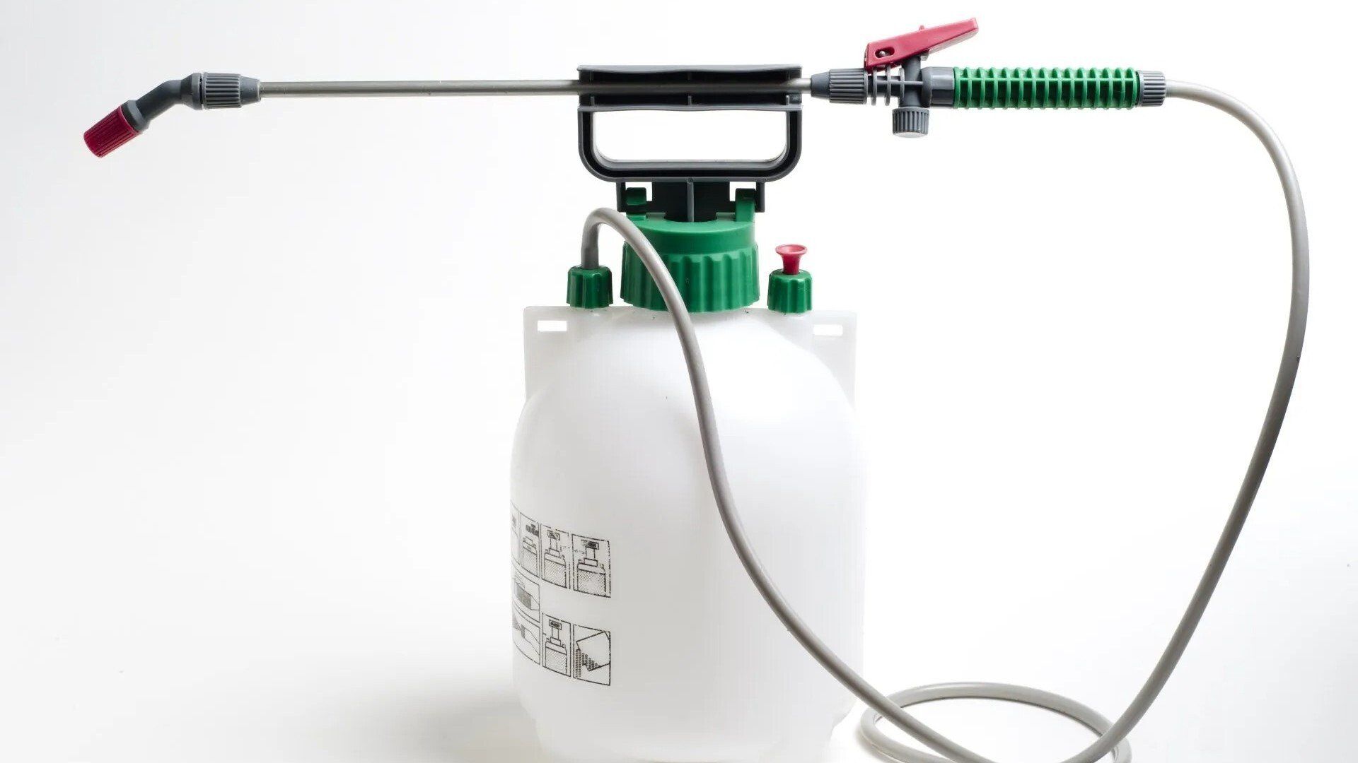 Chemicals — Lewisville, TX — AAA Recycling, Inc. White and green handheld garden sprayer with a long nozzle on a white background.