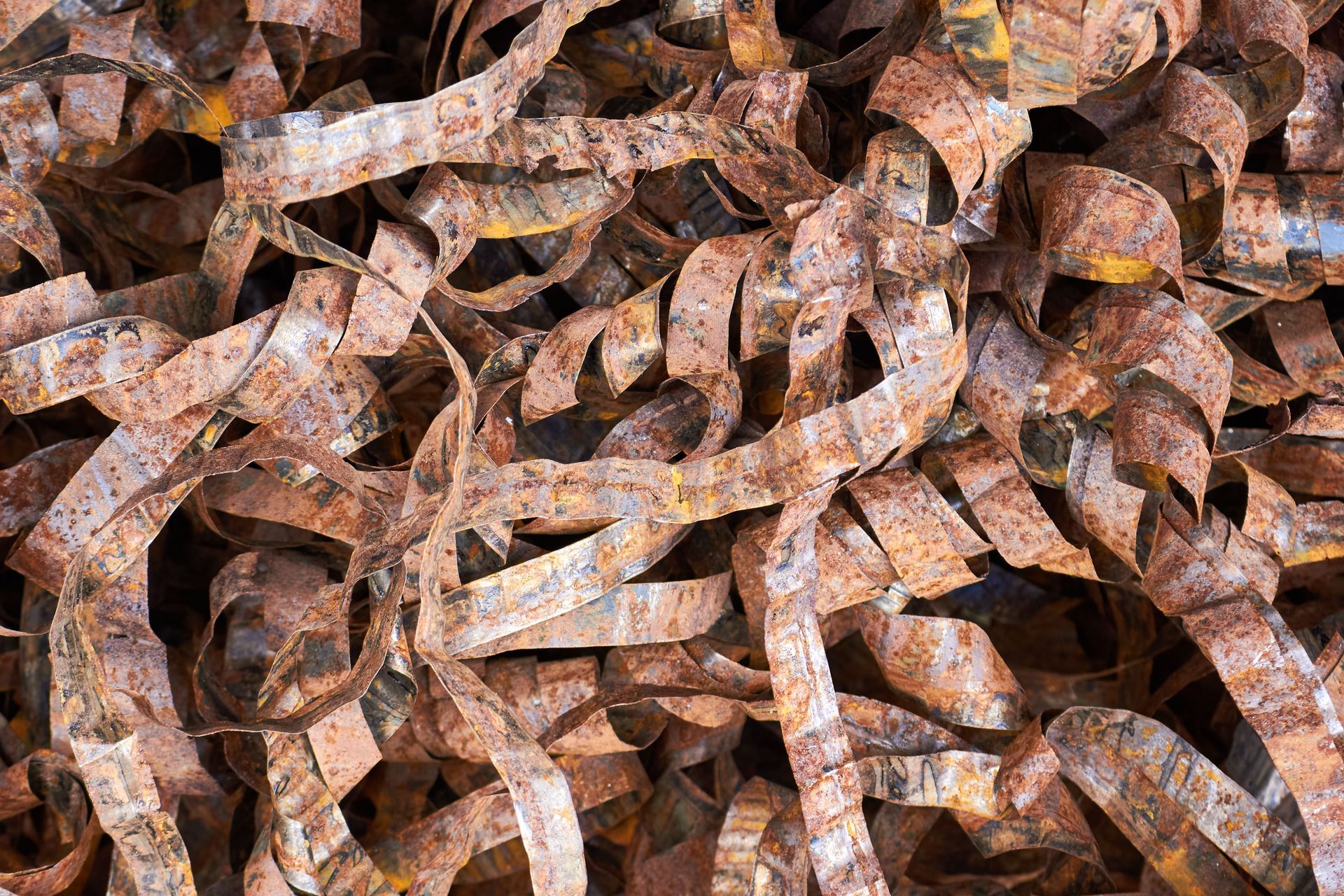 Pile of rusty metal scraps used metal braid of high voltage cable texture. Pile of rusty metal scraps used metal braid of high voltage cable texture.