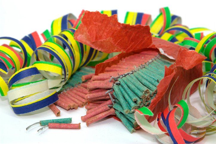 Explosive Materials — Lewisville, TX — AAA Recycling, Inc. Confetti and exploded poppers: red, green, yellow, blue streamers.