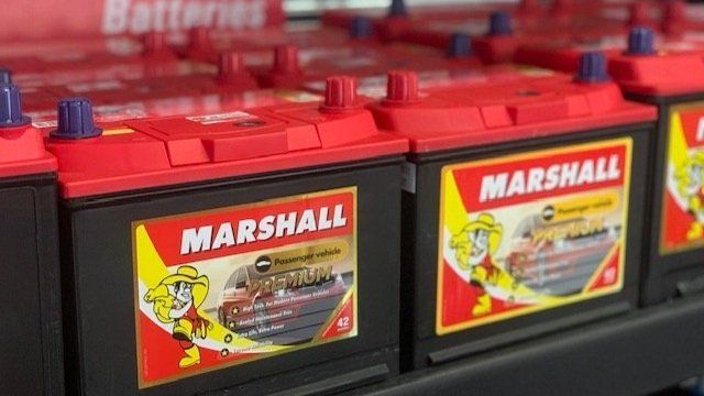 A Bunch Of Batteries Are Sitting On A Shelf In A Store — Marshall Batteries & Cairns Mobile Batteries In Manunda, QLD
