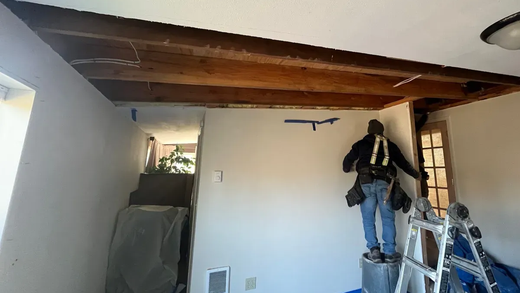 Drywall installation and finishing during residential remodel