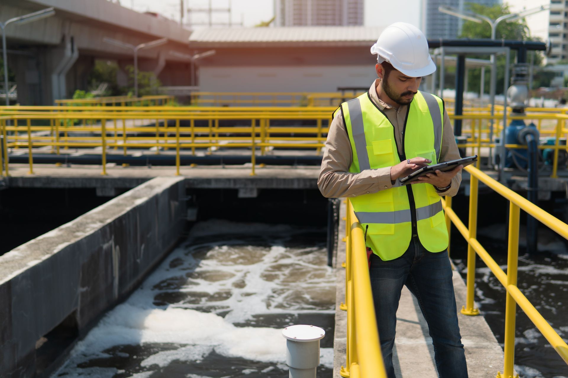 Water treatment technician inspecting a treatment facility in Cedar Rapids, IA