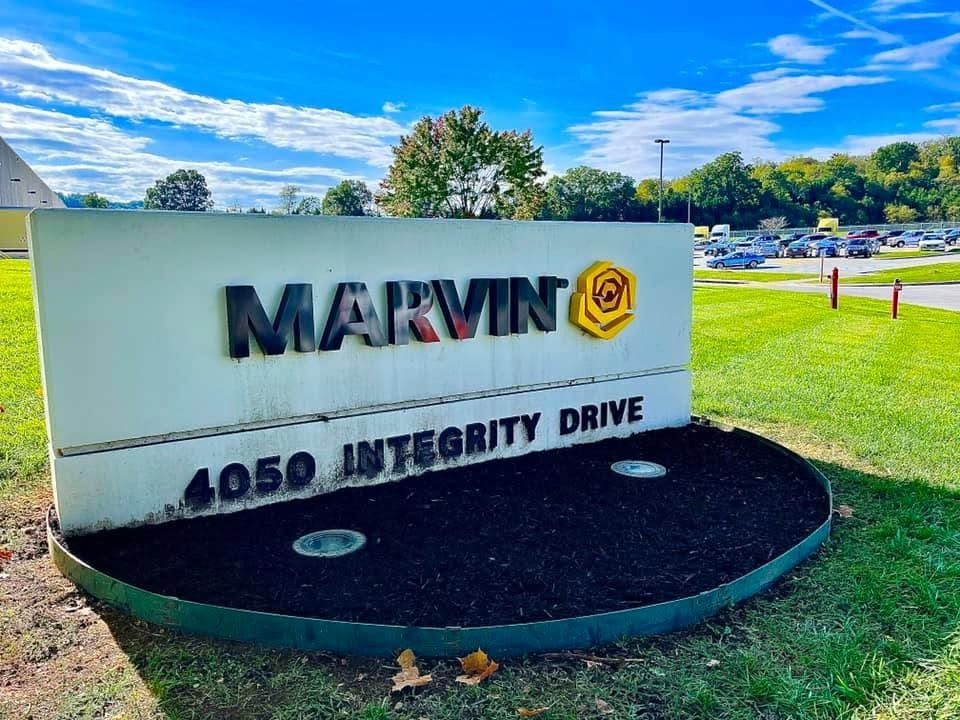 Marvin company sign at 4050 Integrity Drive on a sunny landscaped lawn