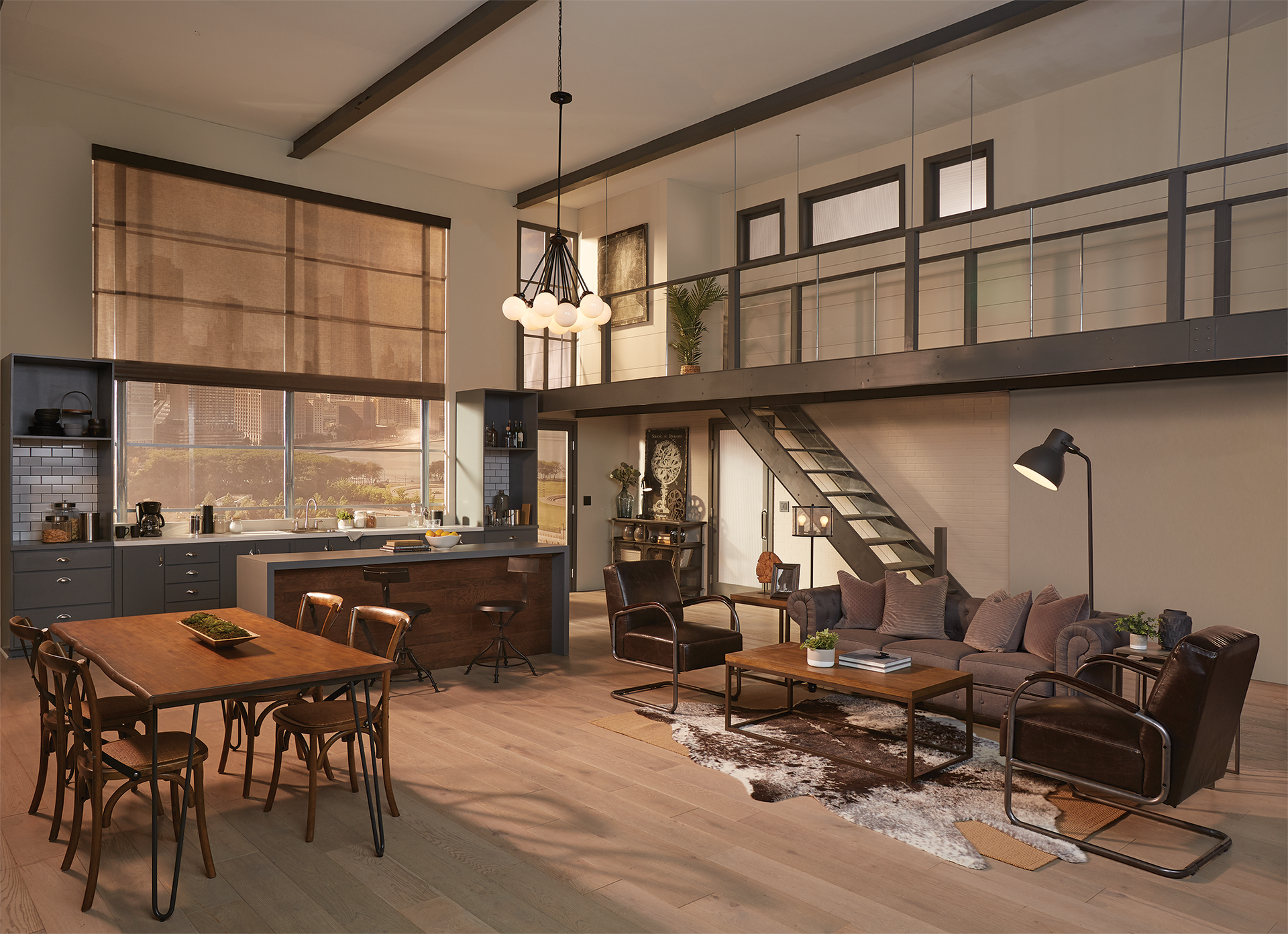 Roller shades across tall windows in a warm open-plan loft living and dining space