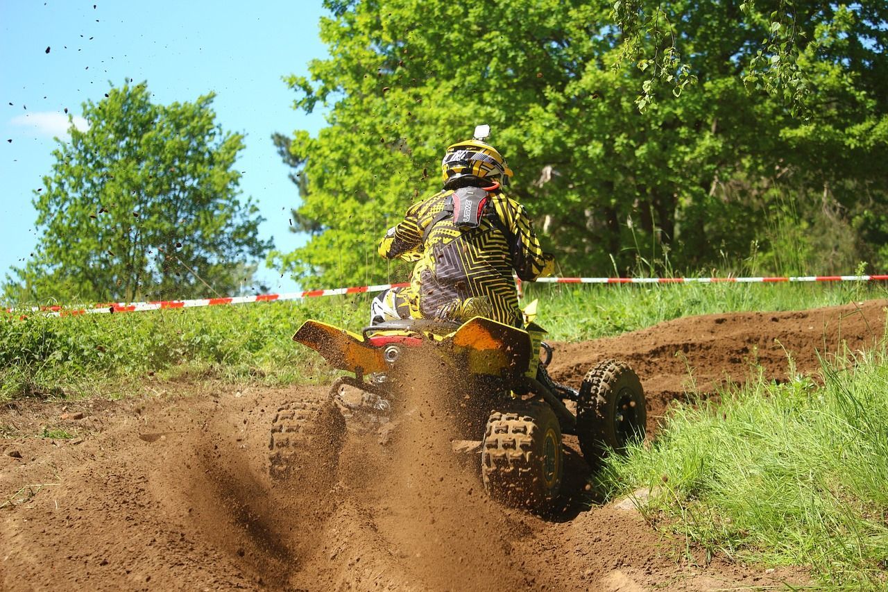 motor cross atv going up mountain
