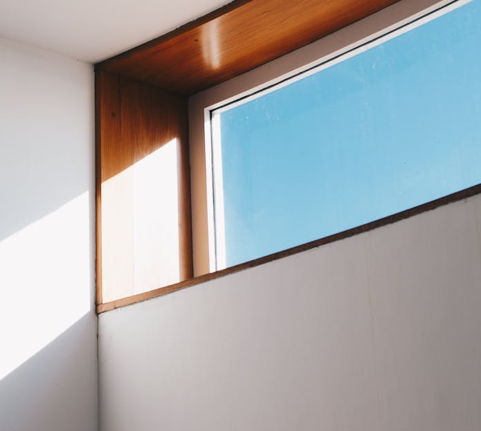 A window with a blue sky behind it