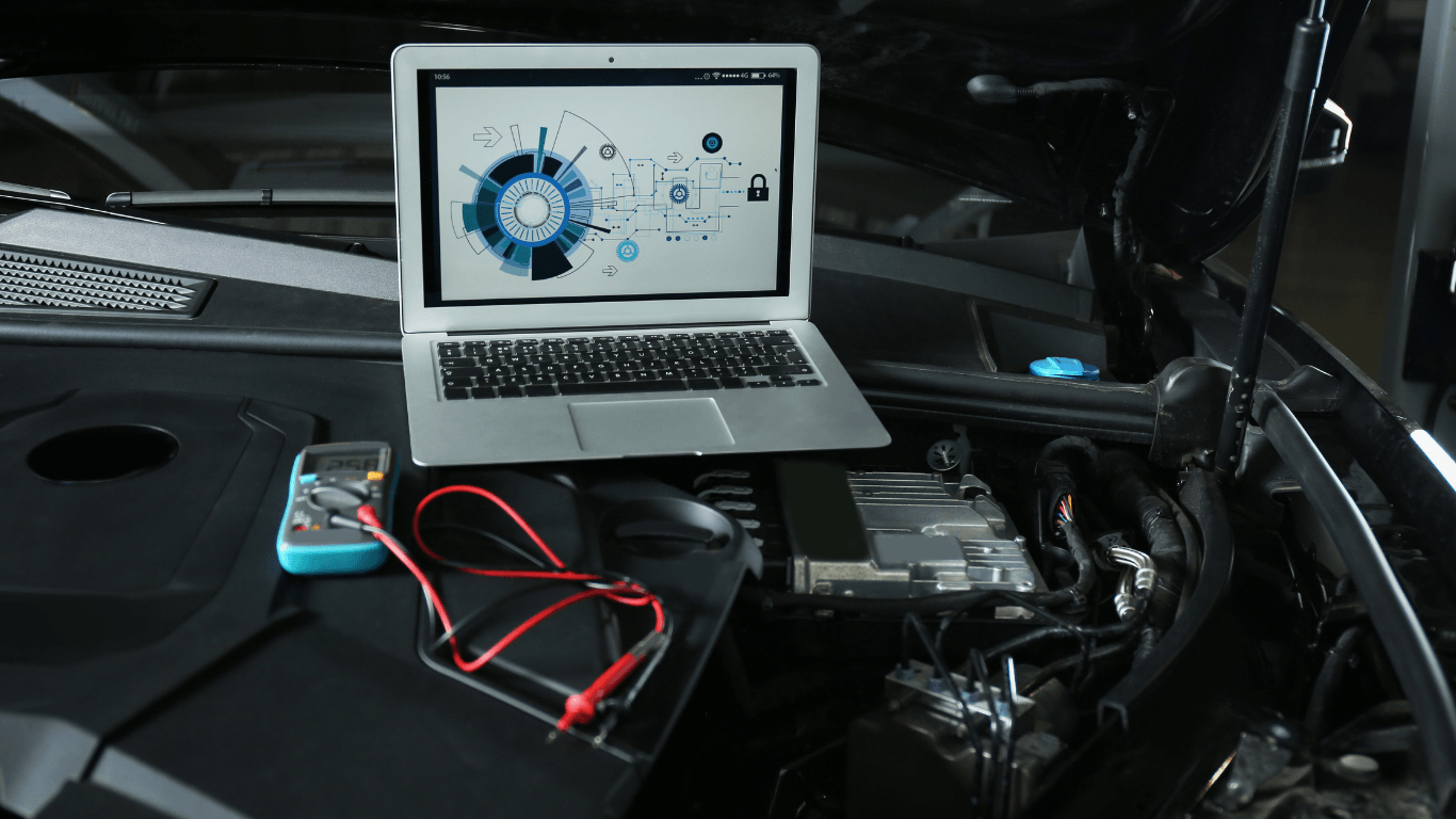 A mechanic with black gloves changing brake parts