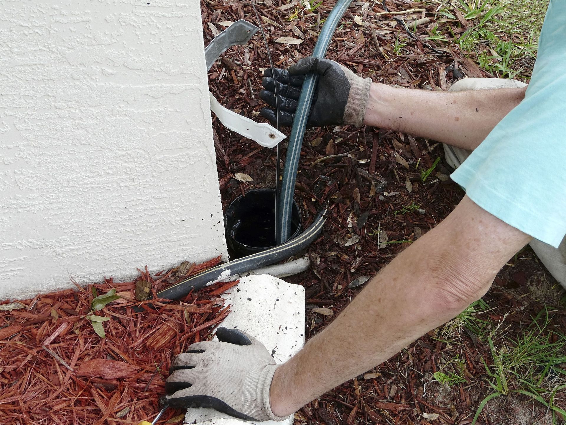 Using Sewer Rod to Clear Blockage.