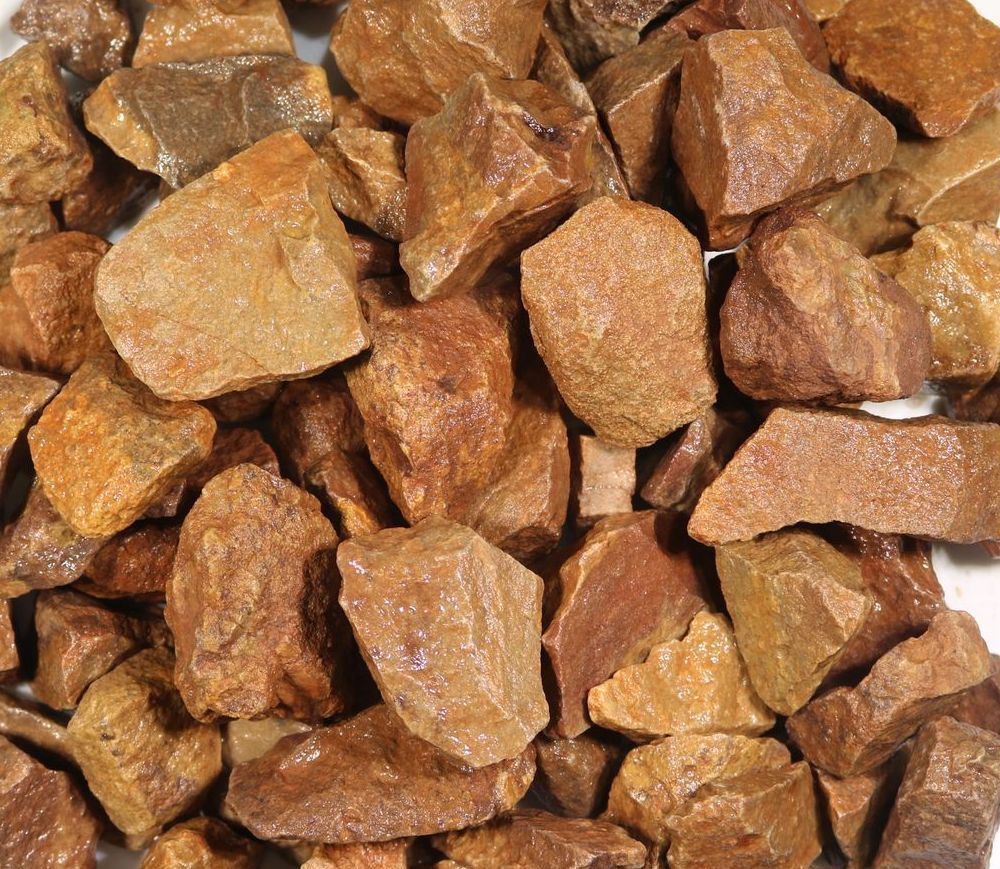 A pile of rocks sitting on top of each other on a table.