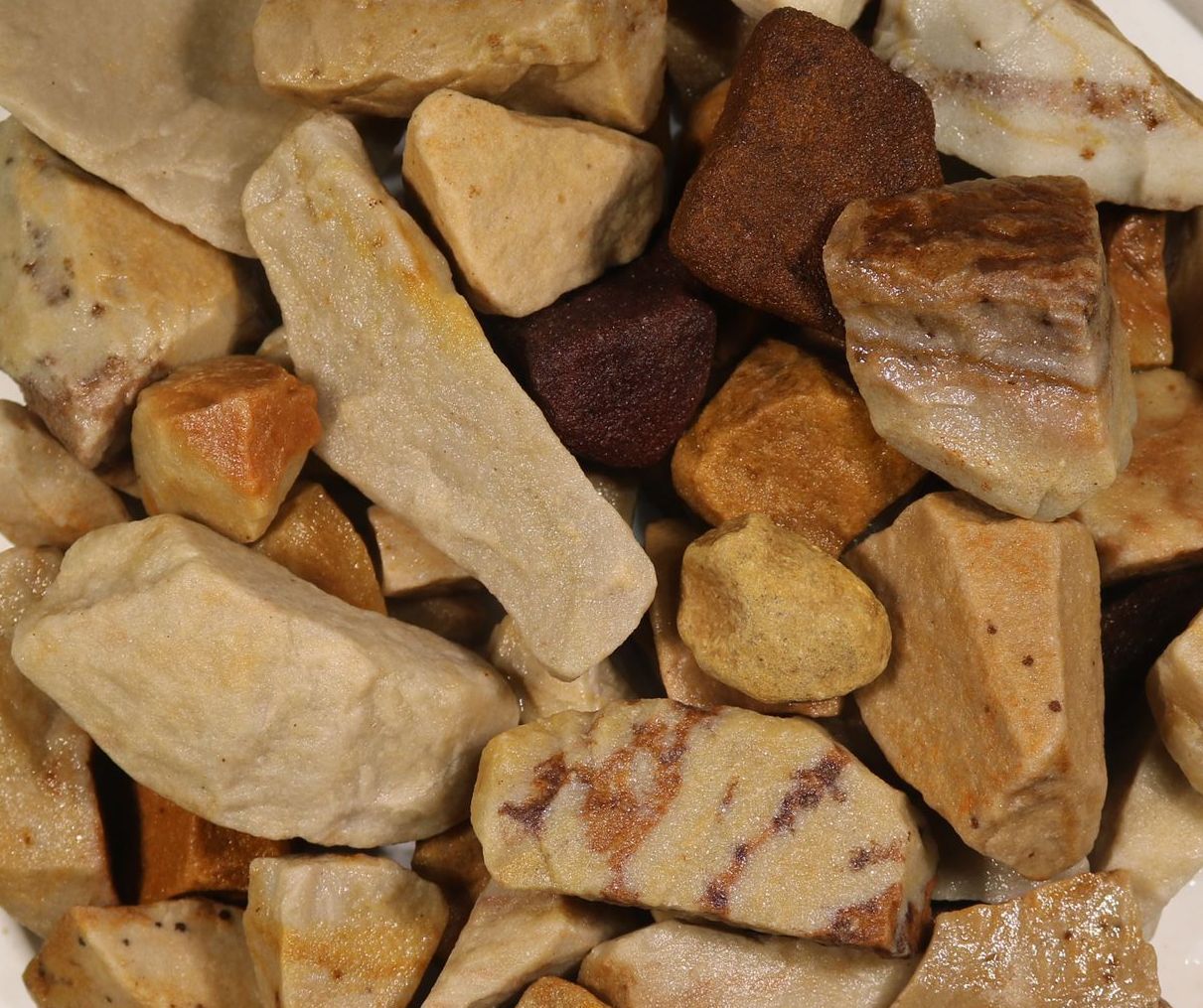 A pile of rocks sitting on top of each other on a table.