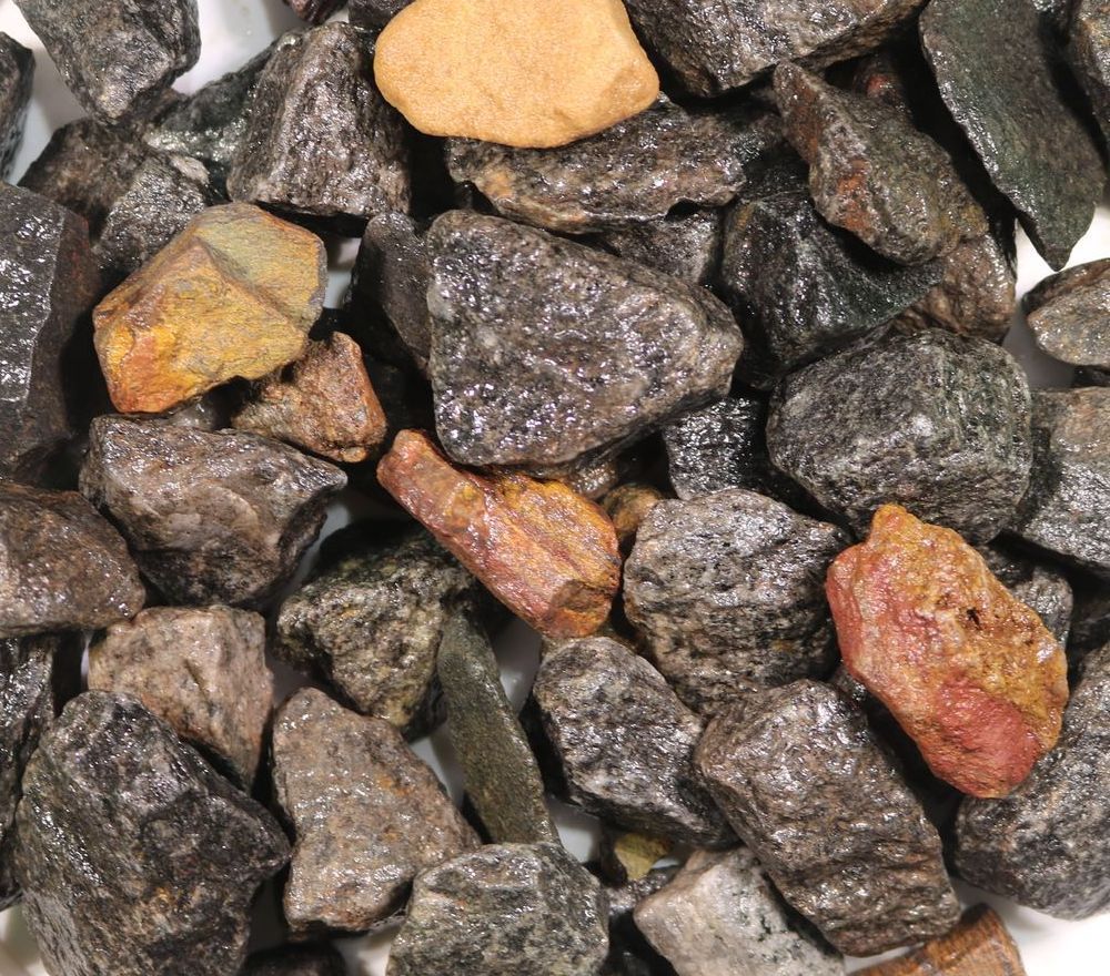 A pile of rocks on a white plate