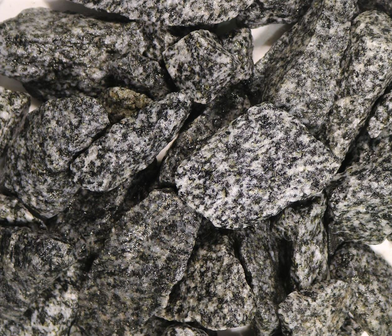A pile of rocks sitting on top of each other on a table.