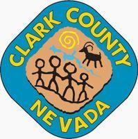 Clark County, Nevada seal with stick figures, mountain, sun, and a bighorn sheep on blue background