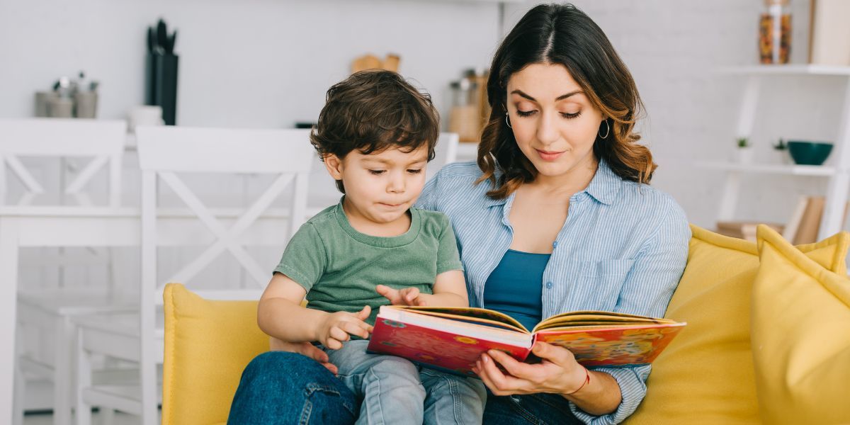 Mother Teaching Her Son to Read — Fort Thomas, KY — Kids & Cribs Early Childhood Enrichment Center
