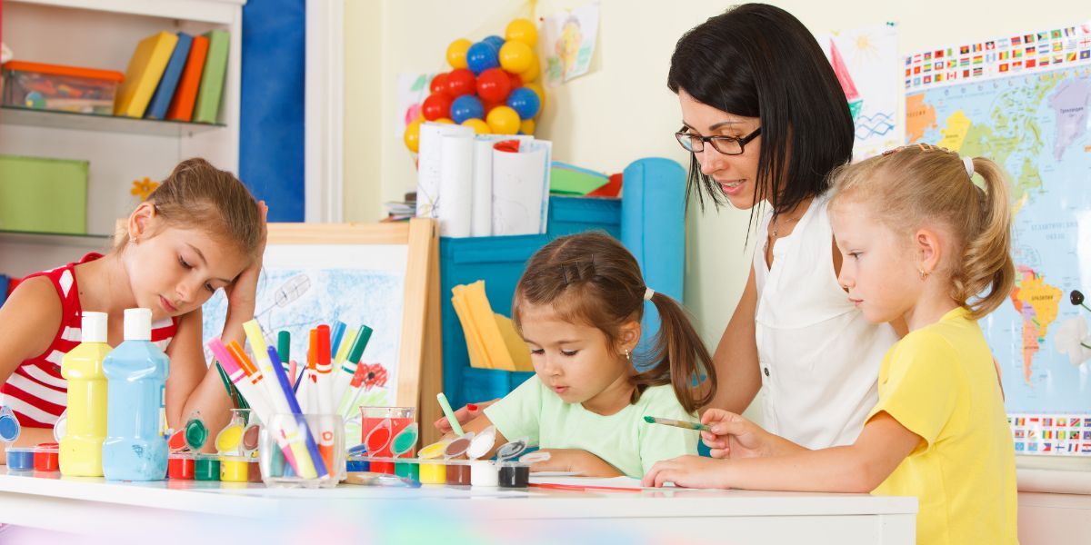 Teacher With Her Students — Fort Thomas, KY — Kids & Cribs Early Childhood Enrichment Center