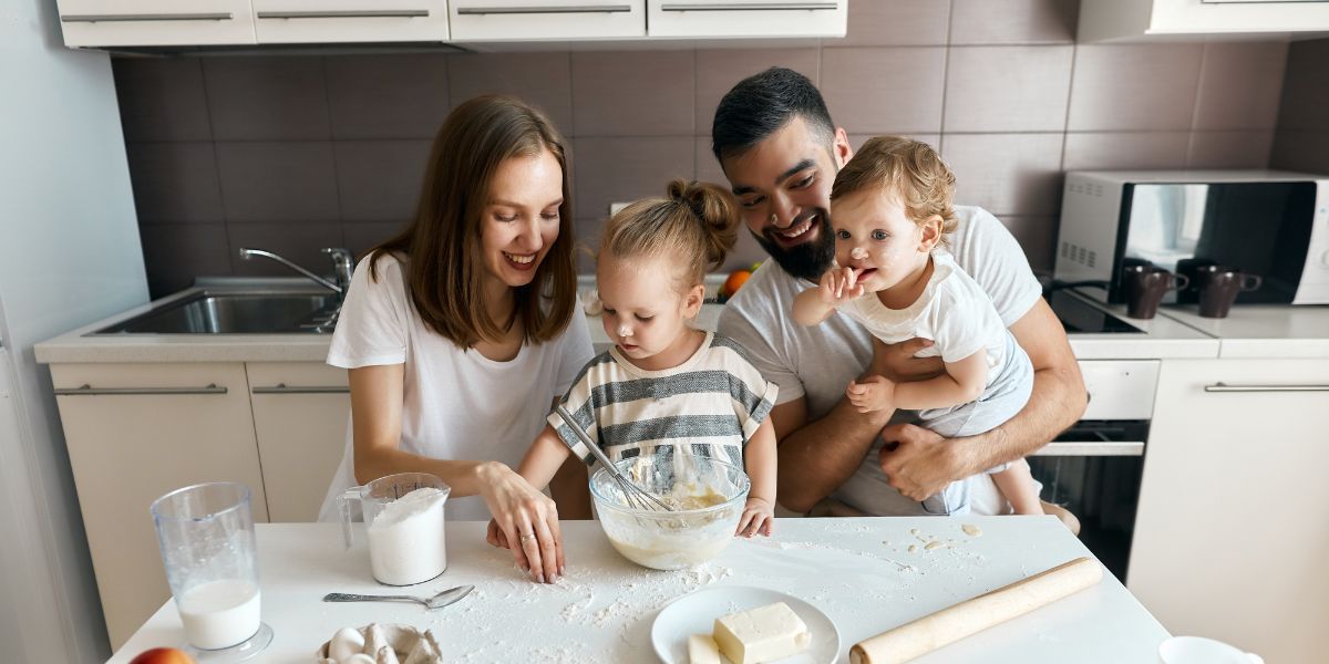 Family Doing Baking Activity — Fort Thomas, KY — Kids & Cribs Early Childhood Enrichment Center