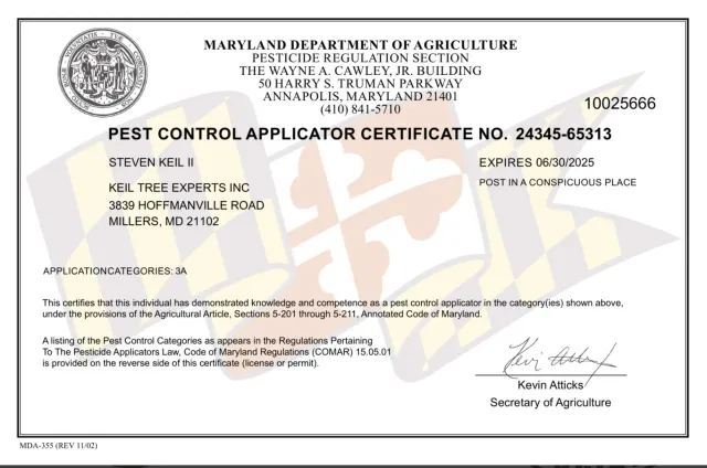 Maryland pesticide applicator certificate document with official seal and handwritten signature, on white paper