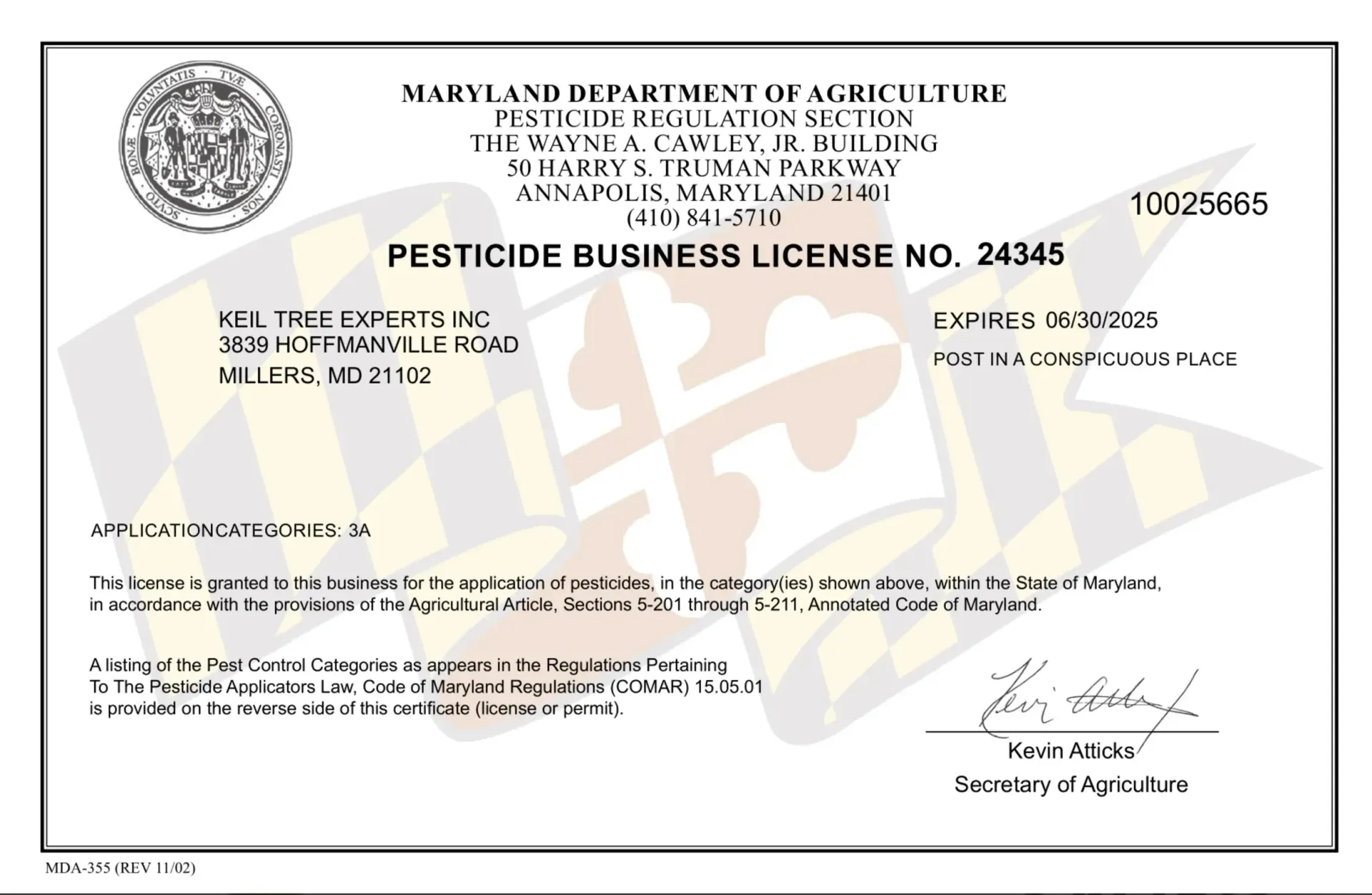 Pesticide business license certificate with official seal and signatures on a white form