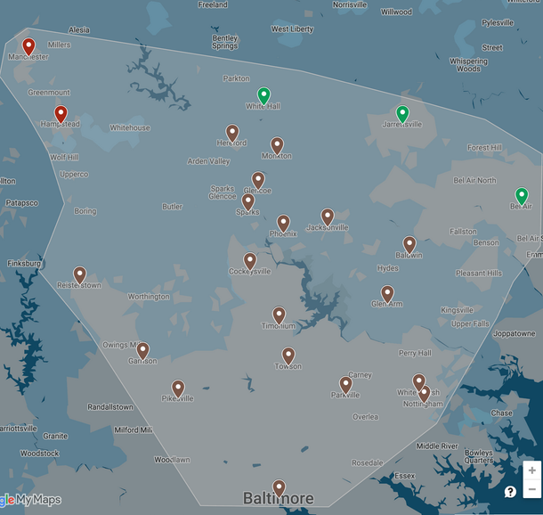 Map of the Baltimore area with multiple location pins and a shaded polygon boundary.
