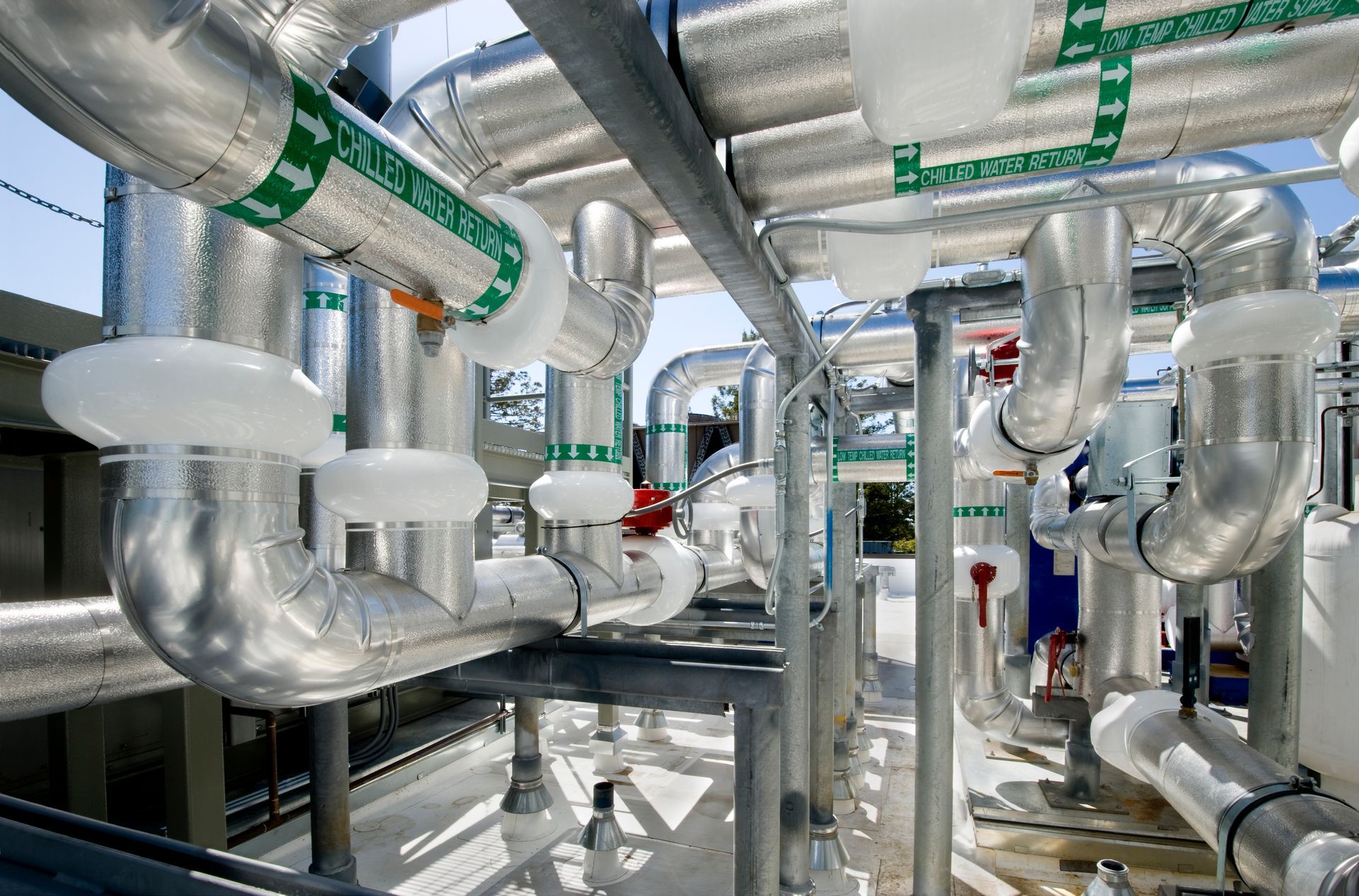A bunch of pipes are connected to each other in a factory.