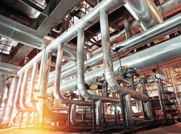 A factory filled with lots of pipes and valves.