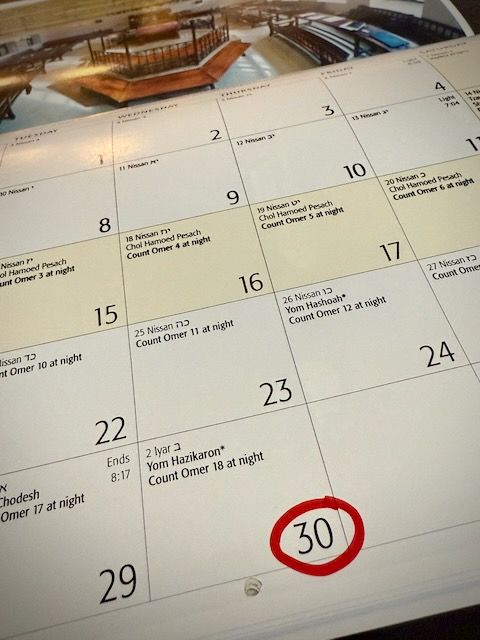 A calendar with the number 30 circled in red