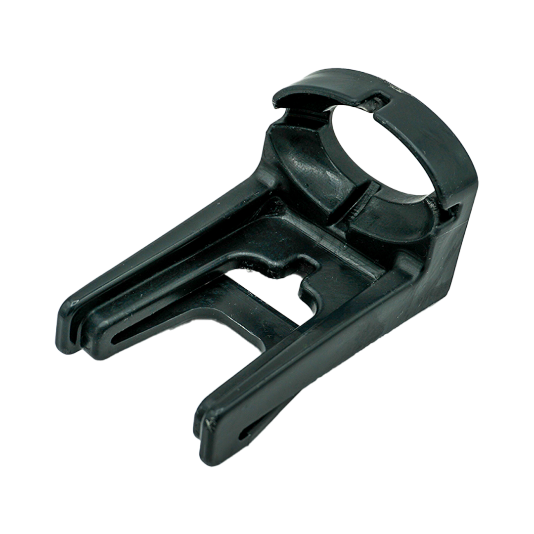 A black plastic object with a hole in the middle