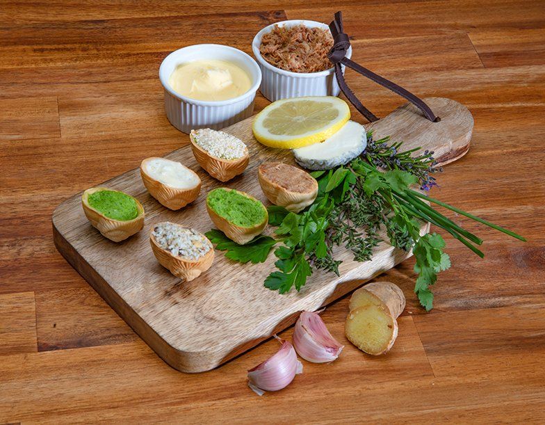 Assiette apéritive de 6 recettes d'escargots français de l'atelier de l'escargot français