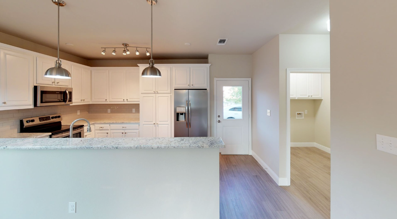 1003 Ave. A