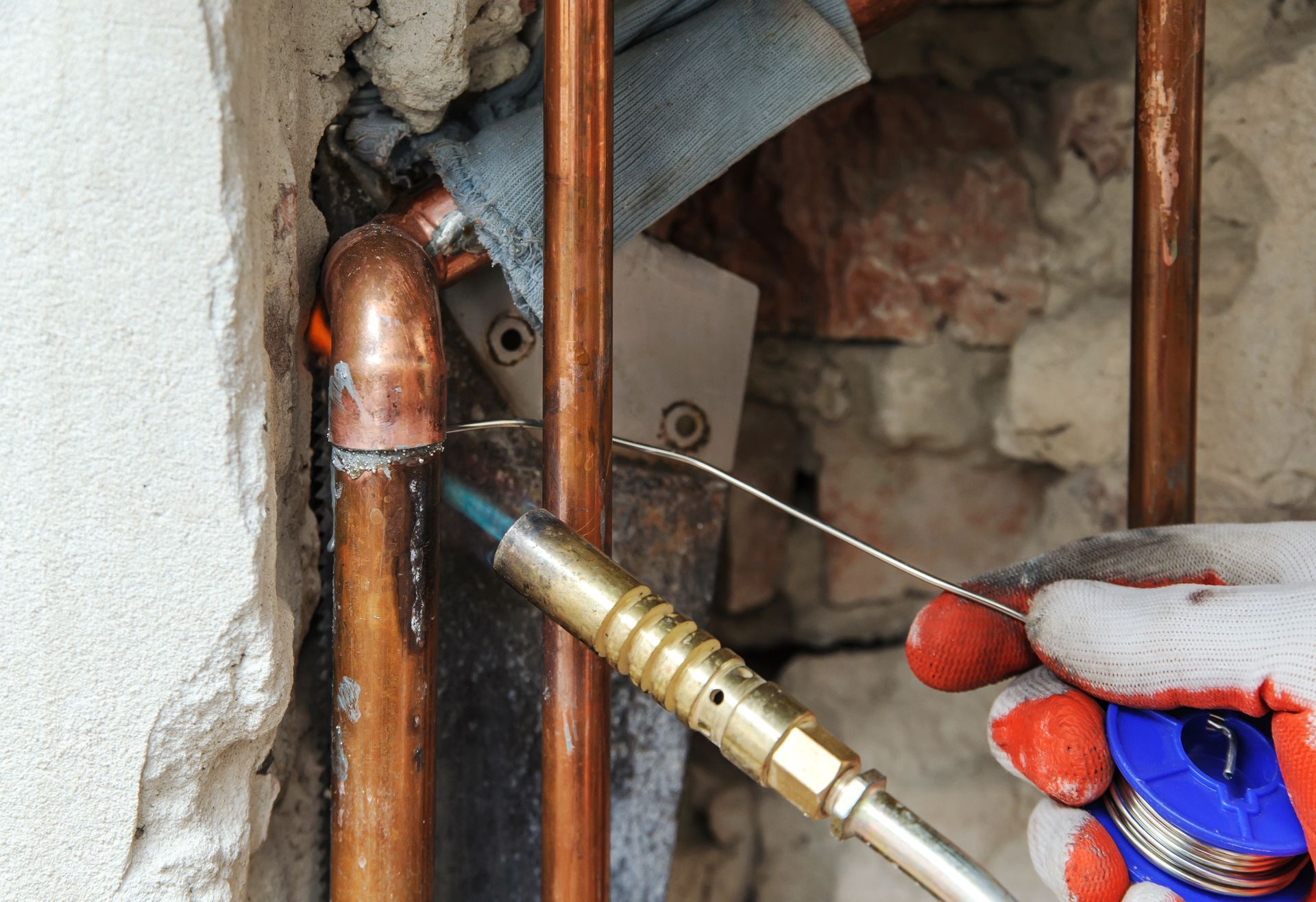 Burst pipes behind wall in Queens, NY