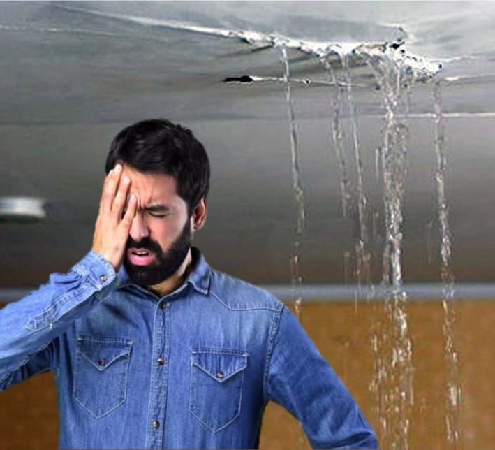 water running out of the ceiling from burst pipes in Queens, NY