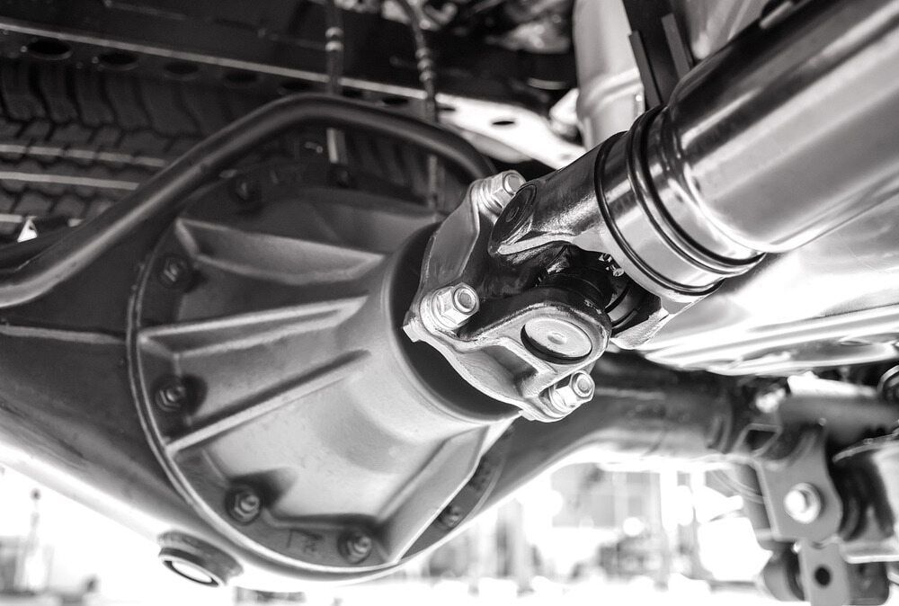 A Black And White Photo Of The Underside Of A Car — Cairns Mechanical Workshop In Bungalow, QLD