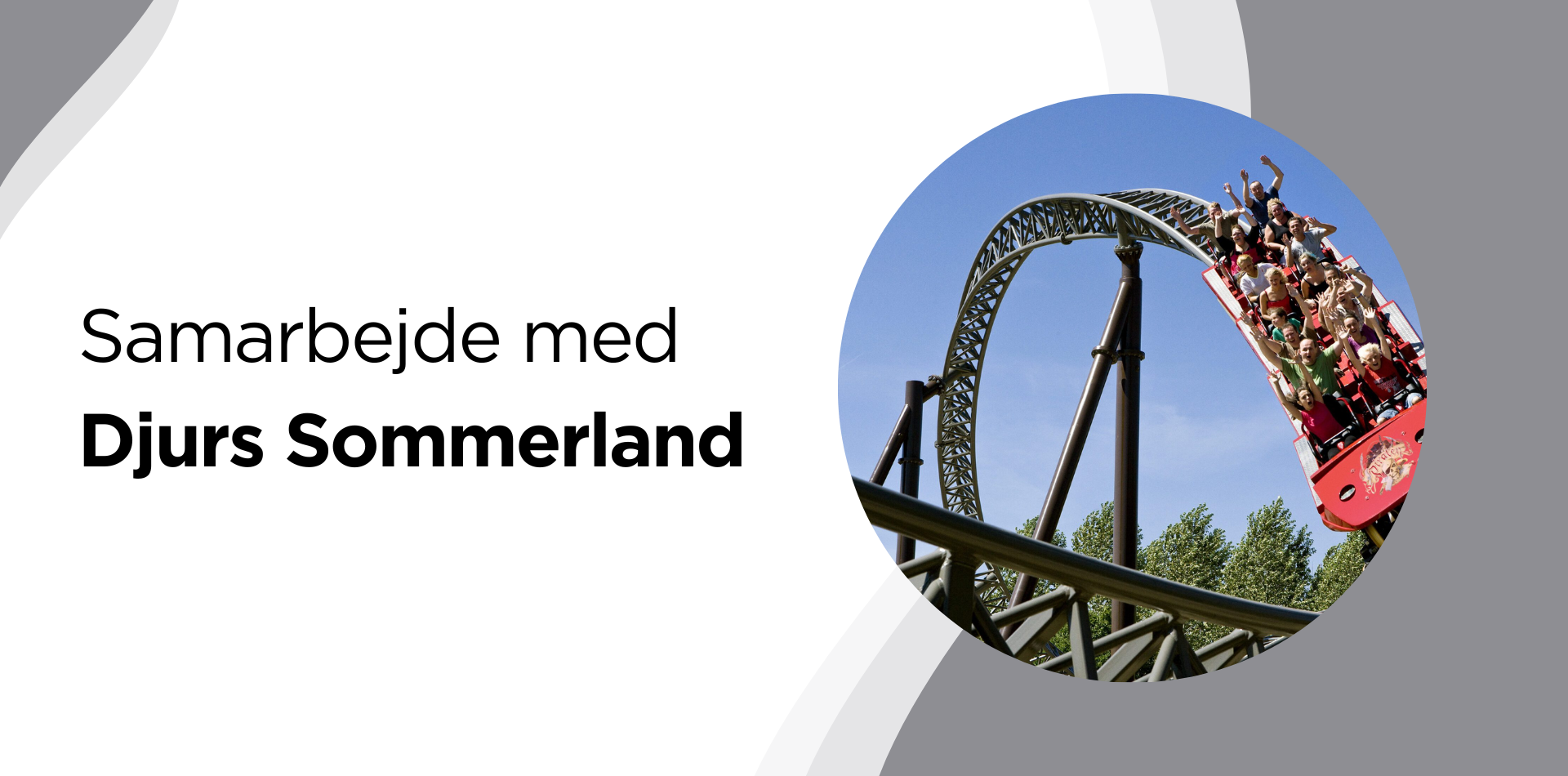 A roller coaster with the words samarbejde med djurs sommerland above it
