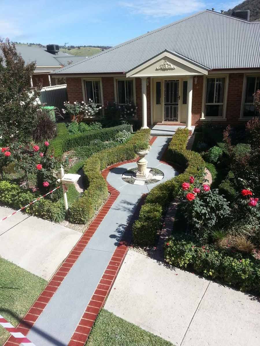 A House With A Brick Walkway Leading To It — Custom Concrete Finishes In Killara, NSW
