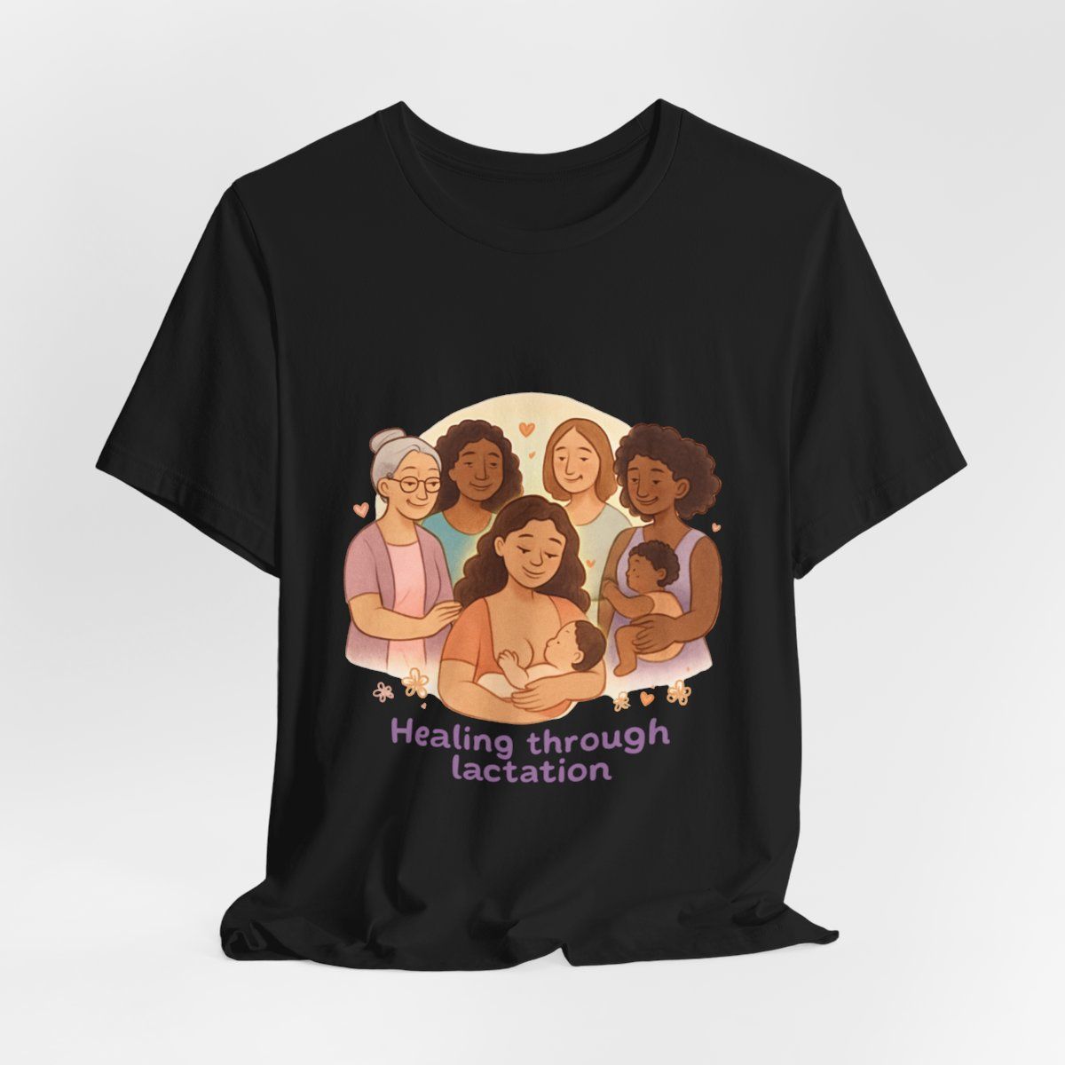 Black T-shirt with illustration of five people and the text “Healing through lactation”