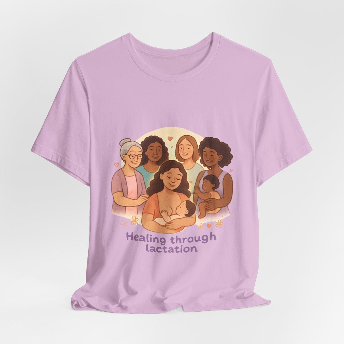 Pink T-shirt with an illustration of six people and the text “Healing through Lactation”