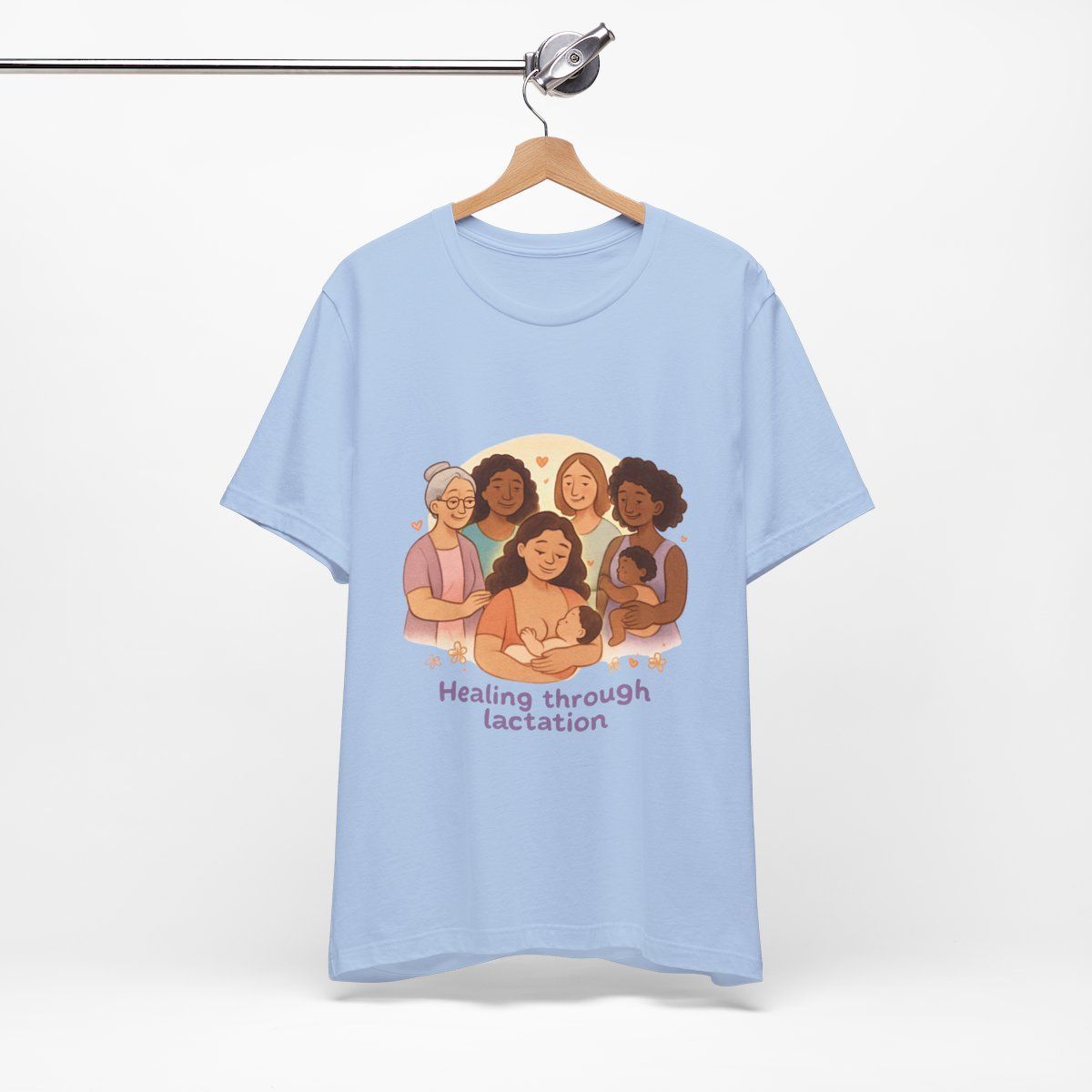 Light blue T-shirt with five illustrated people and the text “Healing through lactation”
