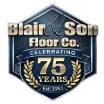 Gold and black 75th-anniversary logo for Blair & Son Floor Co., featuring crossed hammers and the years 1951-2026.