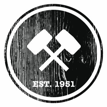 A circular logo on a dark wood texture background features two crossed white hammers with the text