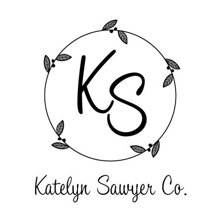 KS monogram logo within a circle of leaves, with 