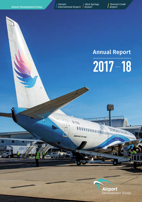Annual report cover: Airplane on tarmac, blue and white,