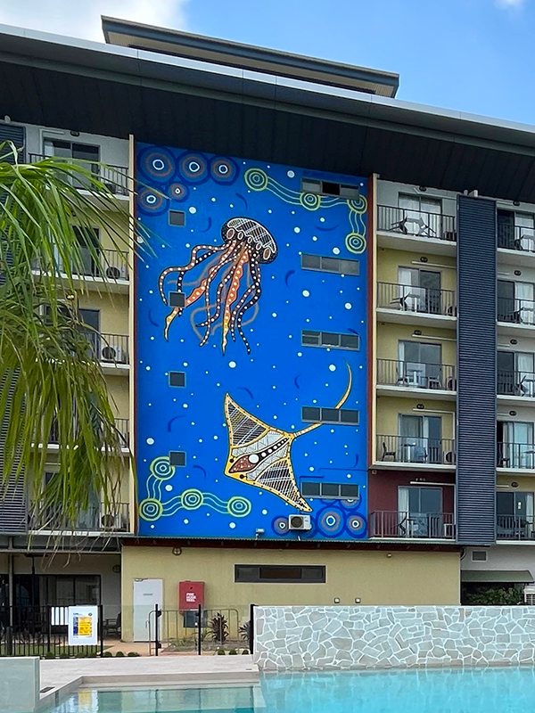 An indigenous Australian artwork on a building.
