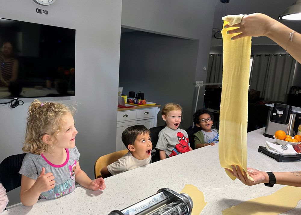 Kids making pasta