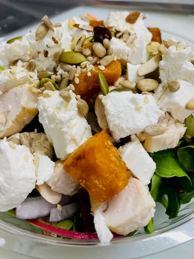 A Close Up of a Salad With Chicken, Cheese and Vegetables — Cedar Park Fish & Chips In Taranganba, QLD
